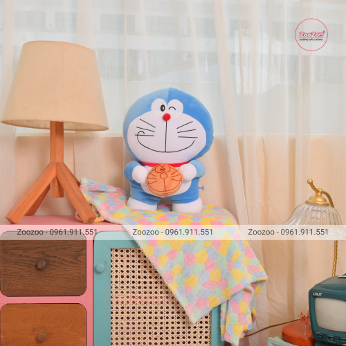 Gối mền Doraemon cầm bánh lông mịn đứng TC